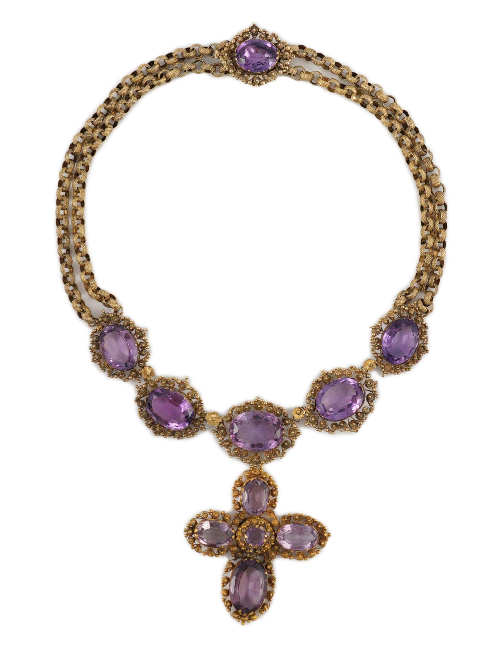 An early 19th century gold and eleven stone oval cut amethyst set pendant necklace and a similar cross pendant (repair)